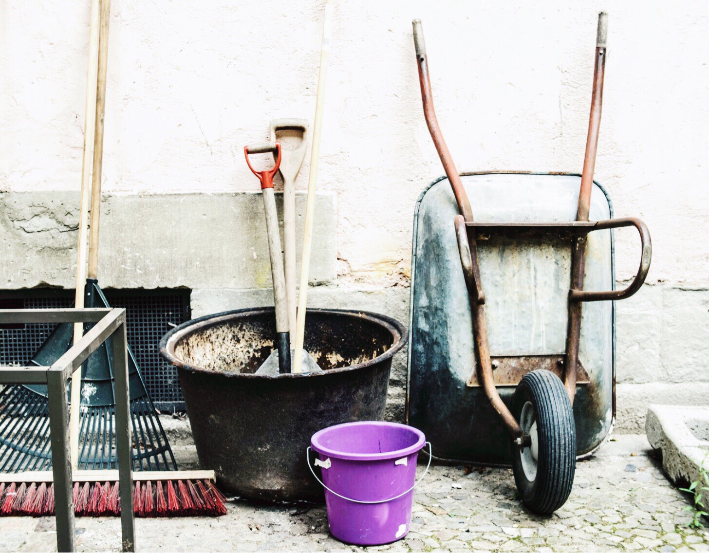 Garden tools leaning against a wall. 5 ways to increase your homes value
